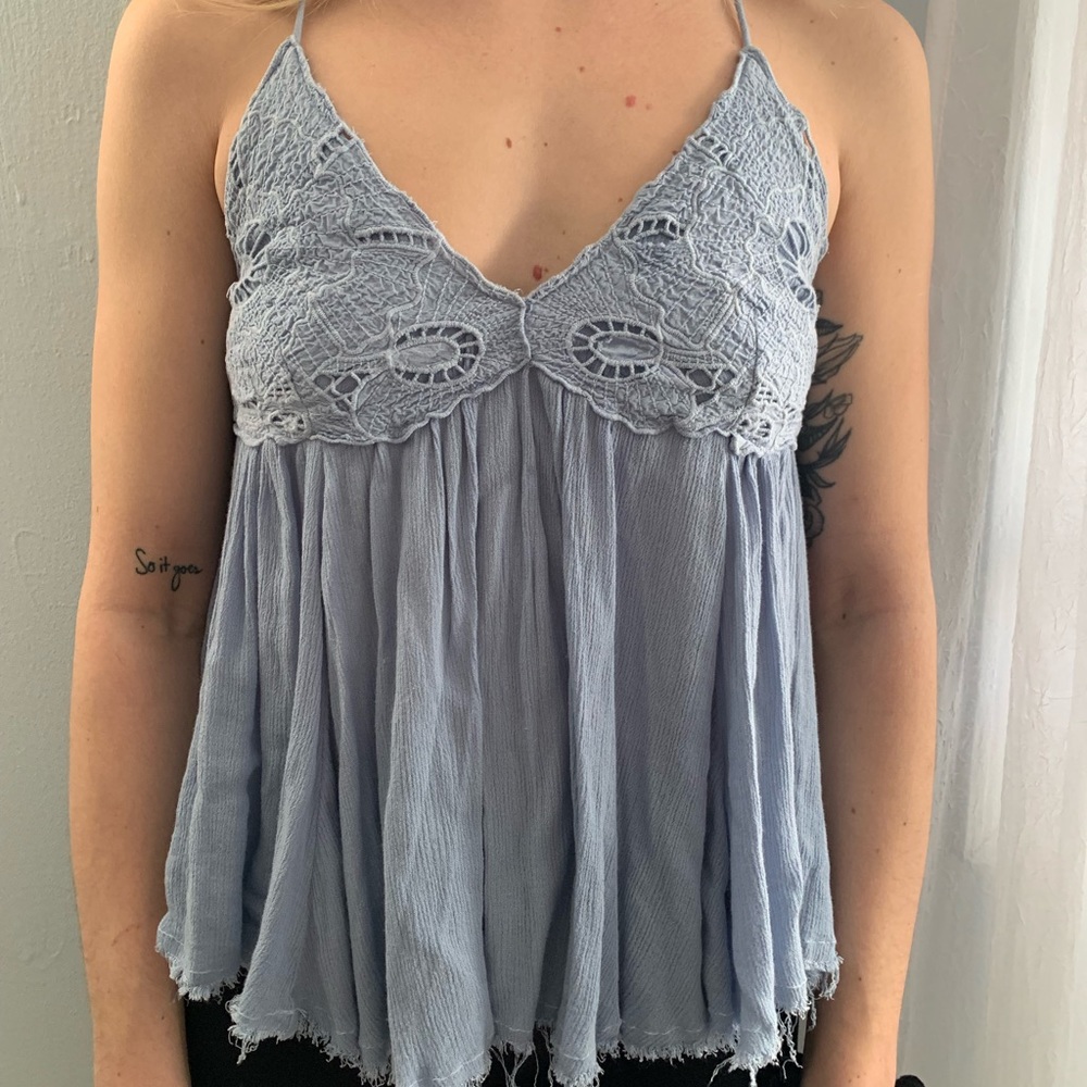 Boutique size small strap blouse